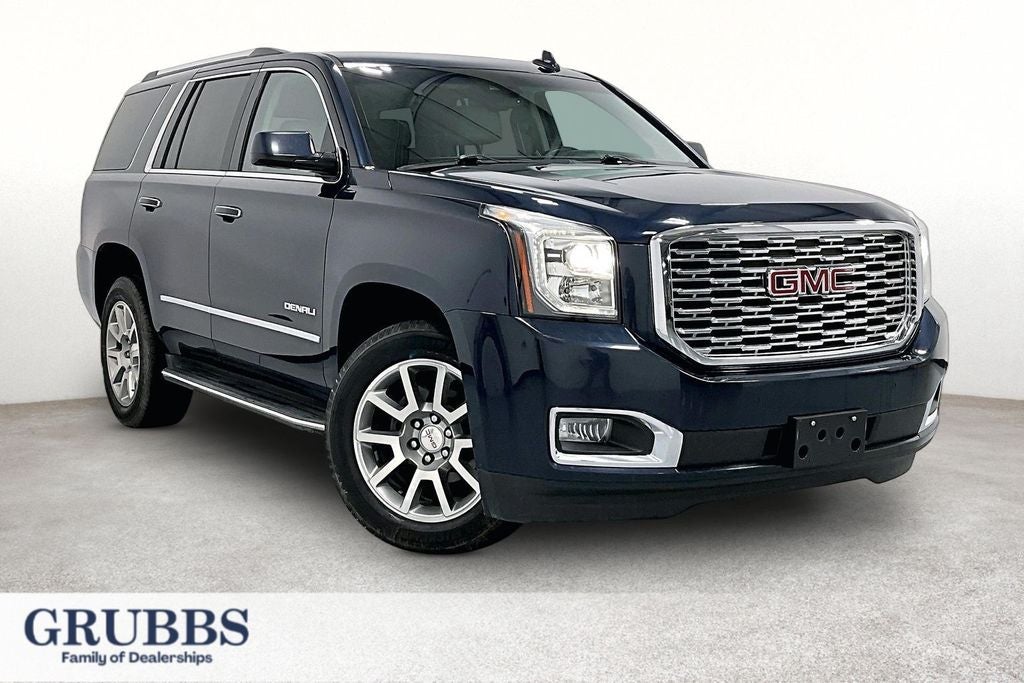 2019 GMC Yukon Denali in Dark Sapphire Blue Metallic — front three-quarter view