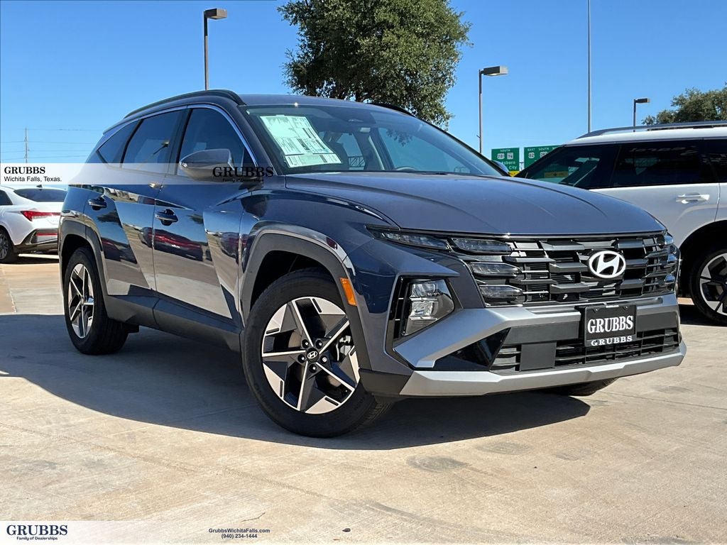 2026 Hyundai Tucson SEL in Atlantis Blue — front three-quarter view