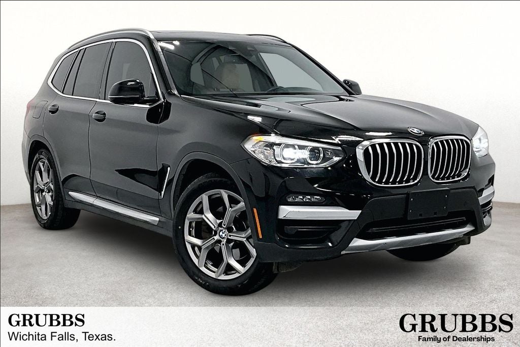 2021 BMW X3 sDrive30i in Jet Black — front three-quarter view