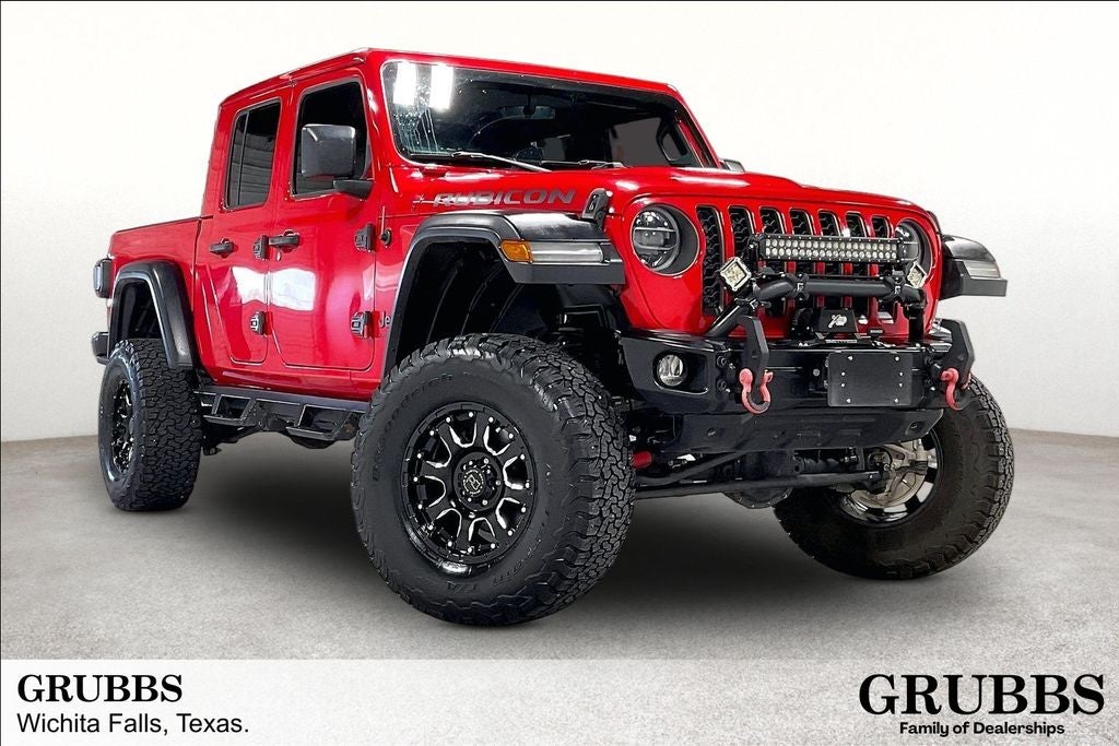 2020 Jeep Gladiator Rubicon in Firecracker Red Clearcoat — front three-quarter view