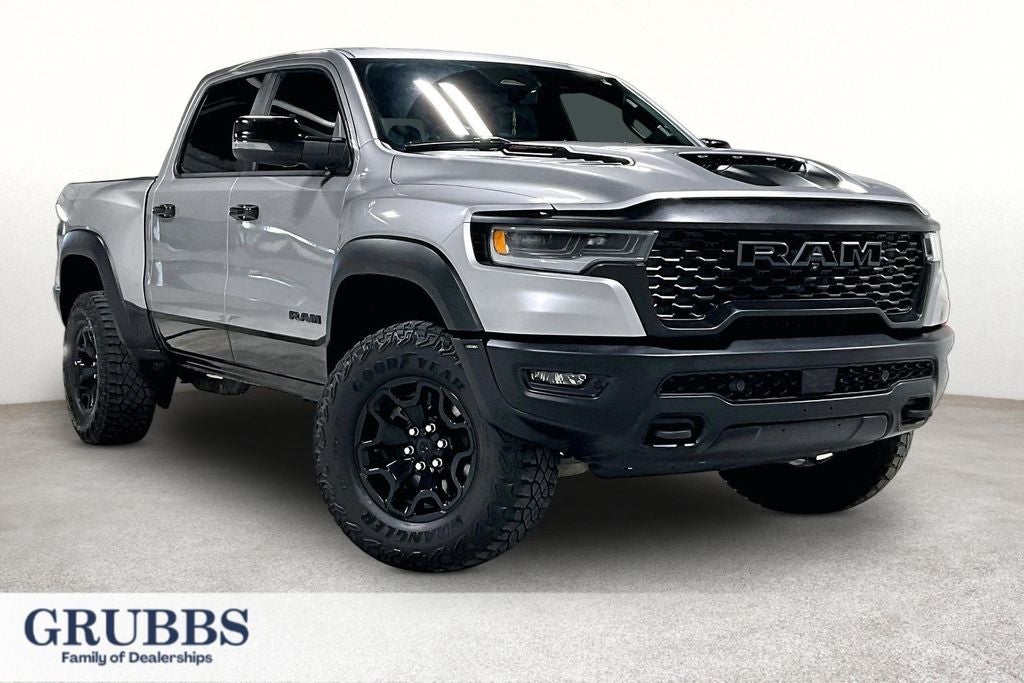 2025 RAM 1500 RHO in Billet Silver Metallic Clearcoat — front three-quarter view