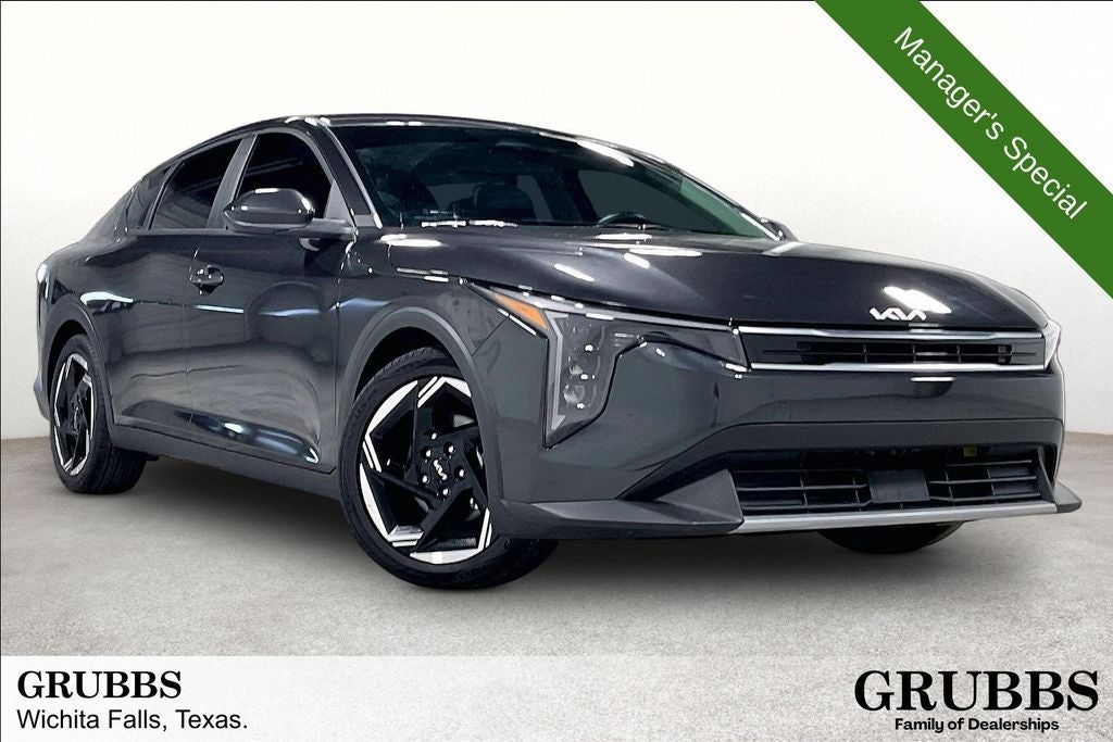 2025 Kia K4 EX in Interstellar Gray — front three-quarter view
