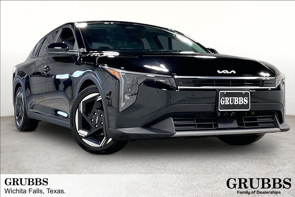 2025 Kia K4 EX in Aurora Black Pearl — front three-quarter view