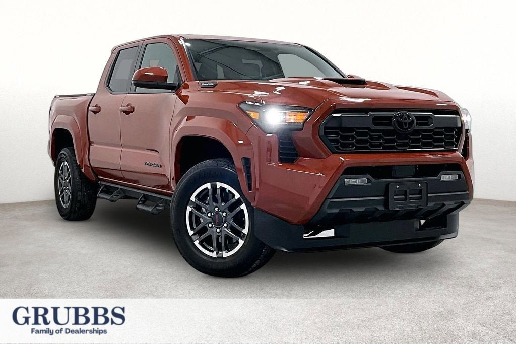 2025 Toyota Tacoma Hybrid TRD Sport 4WD in Brown — front three-quarter view