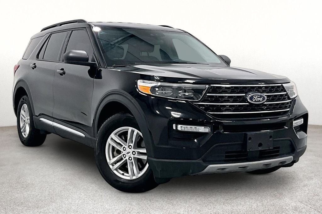 2024 Ford Explorer XLT in Agate Black Metallic — front three-quarter view