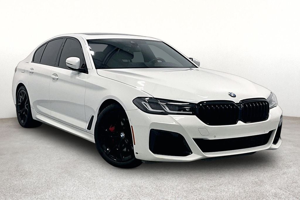 2023 BMW 5 Series 530i in Alpine White — front three-quarter view
